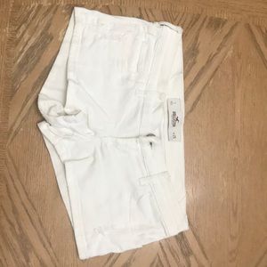 Distressed white short shorts